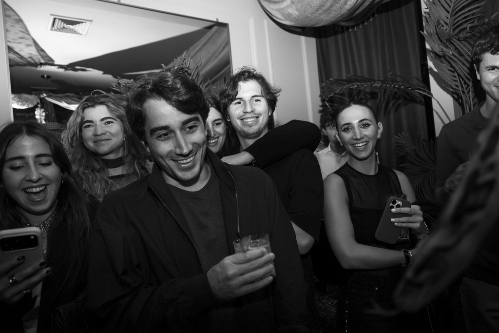 Guests enjoying the WHISPER launch at DEJAVU NY